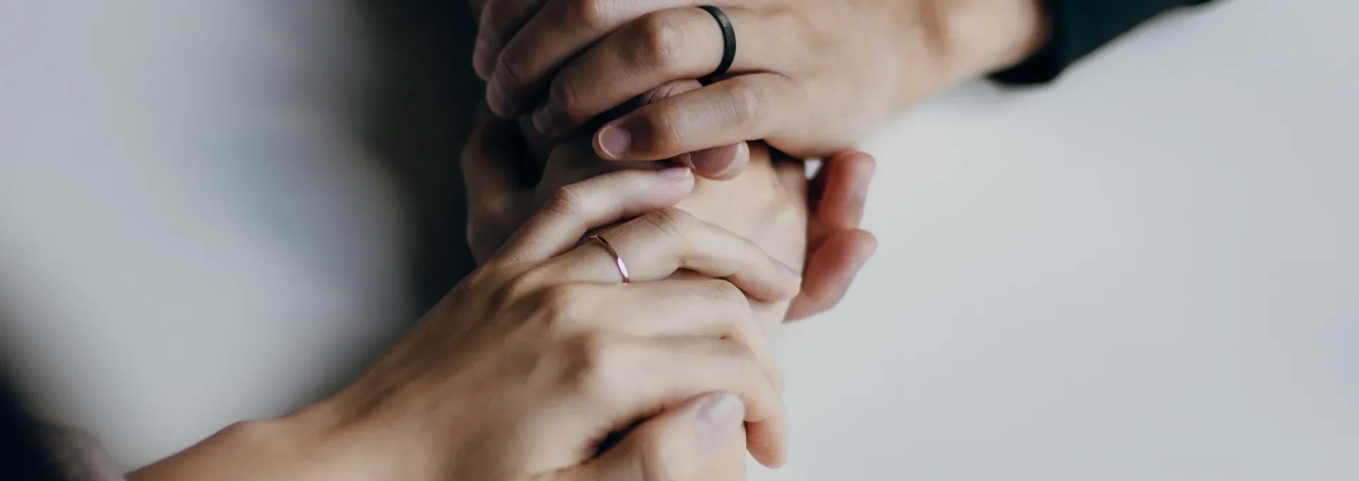 two people holding hands