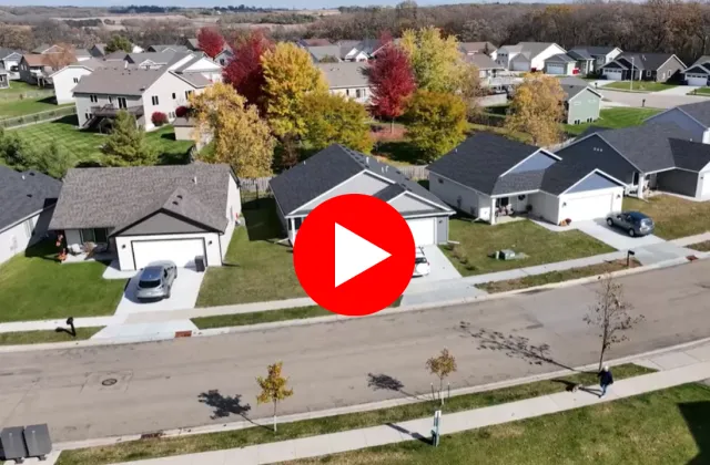 Homes on Red Hawk Drive with play button