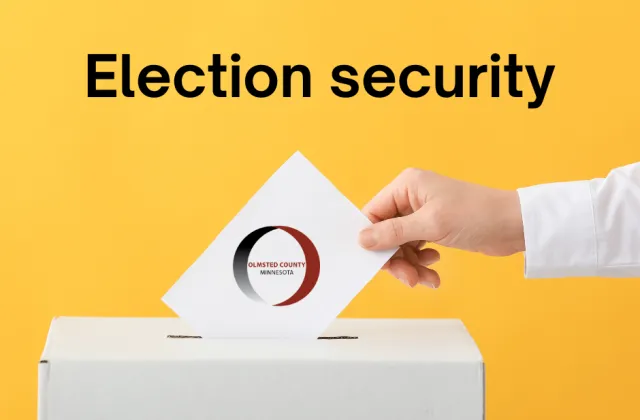 Hand placing ballot in ballot box with Olmsted County logo on it with text over that says Election security