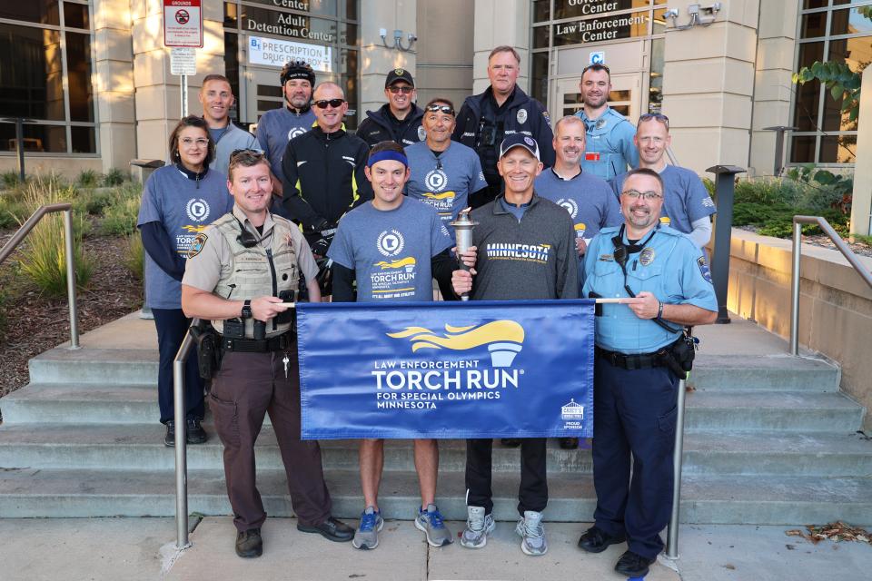 Group photo before law enforcement torch run in Rochester