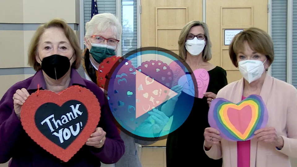 Image of local leaders holding hearts to thank frontline workers. Click this image to be taken to the video.