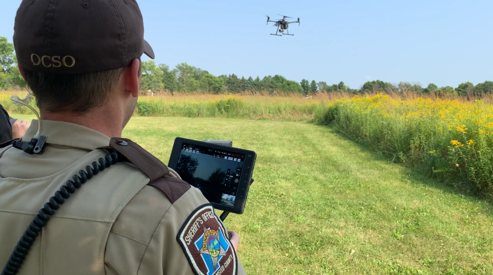 Deputy using drone