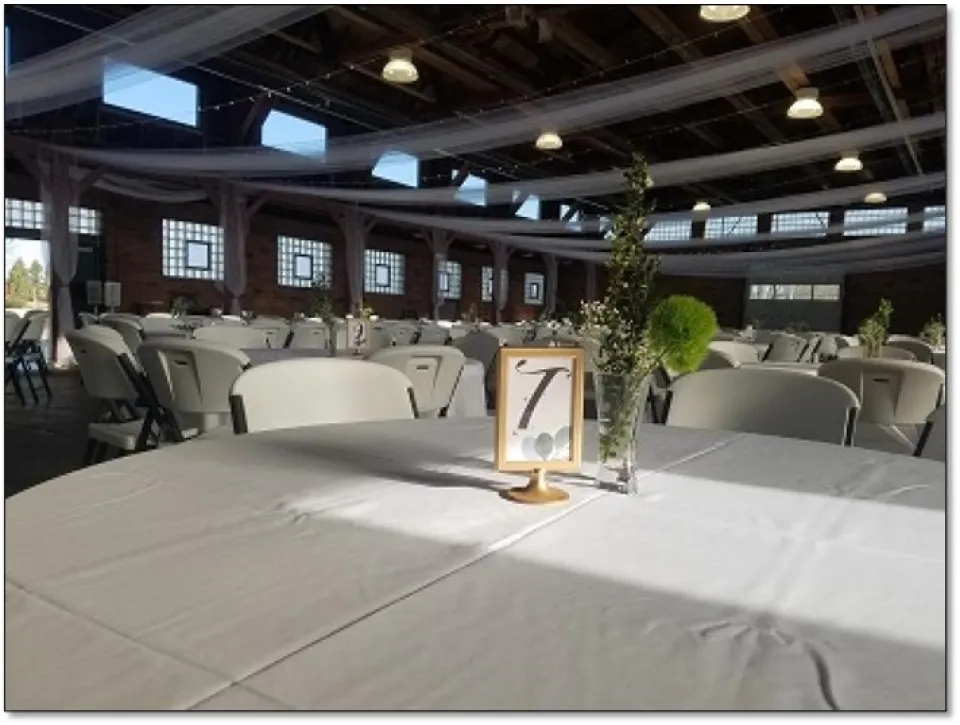 Crawford Hall with round table settings.