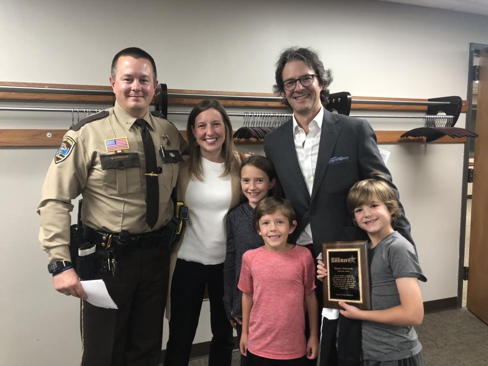 Josh Matti with local family after receiving a life saving award.