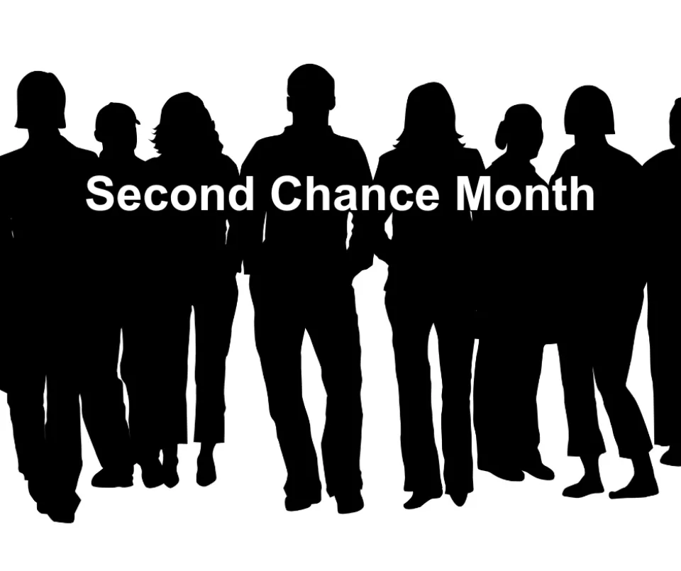 A silhouette of people with the words, "Second Chance Month," over them.