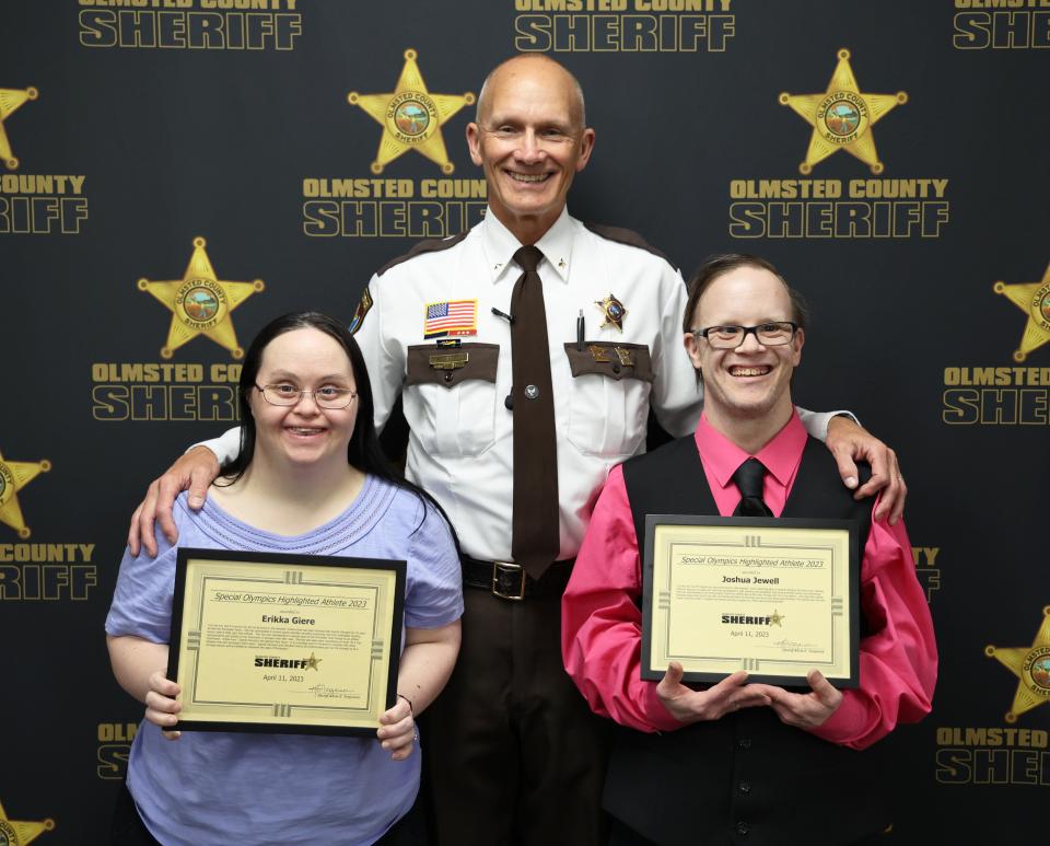 Sheriff with recognized Special Olympic Athletes