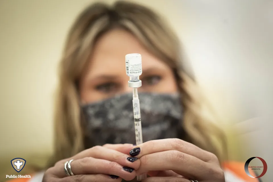 nurse with a vaccine