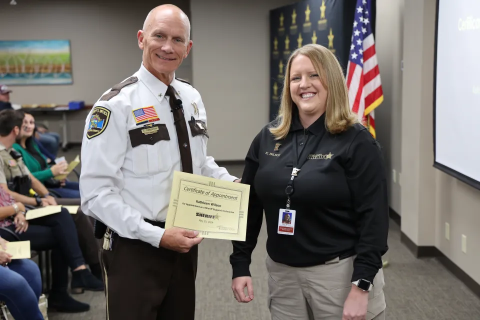 Sheriff's Office Fall Awards Program - Sheriff and certificate of appointment