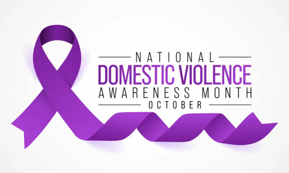 Domestic Violence Awareness Month purple ribbon.