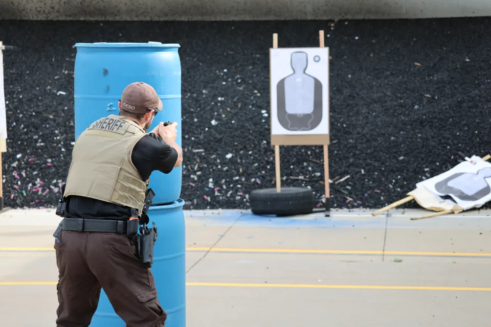 Sheriff's Office deputy training with handgun
