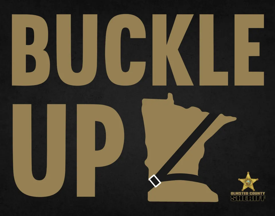 Graphic that says Buckle Up and the state of Minnesota shape wearing a seat belt.