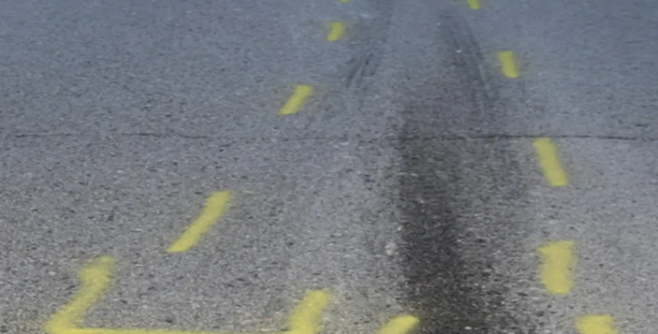 Forensic Mapping Unit example showing paint on the roadway and crash marks