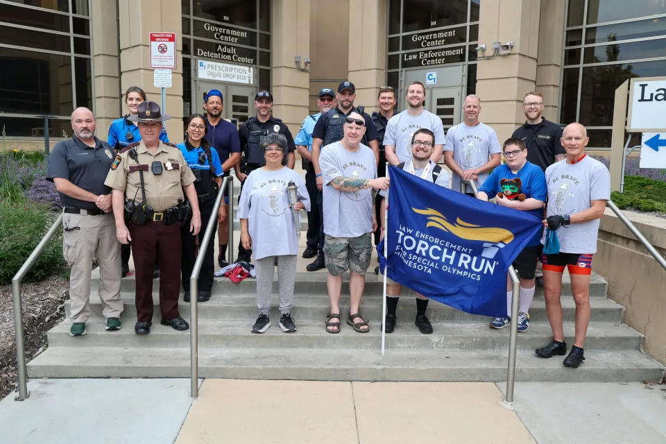 Local law enforcement and Special Olympic athletes gather in front of the Government Center in Rochester, Minnesota prior to the 2025 Law Enforcement Torch Run.