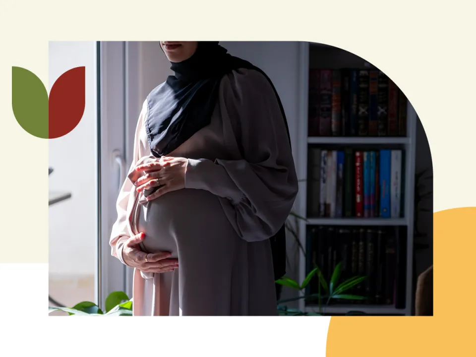 Woman holding a pregnant belly
