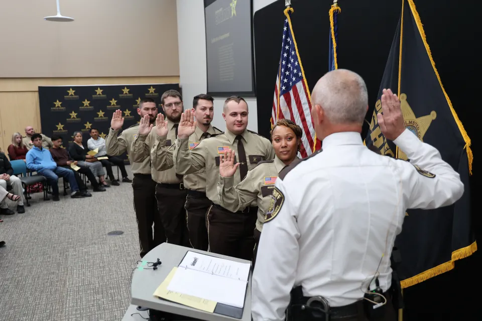 New hires from the Adult Detention Center are publicly sworn in by Sheriff Torgerson before receiving their Certificates of Appointment.