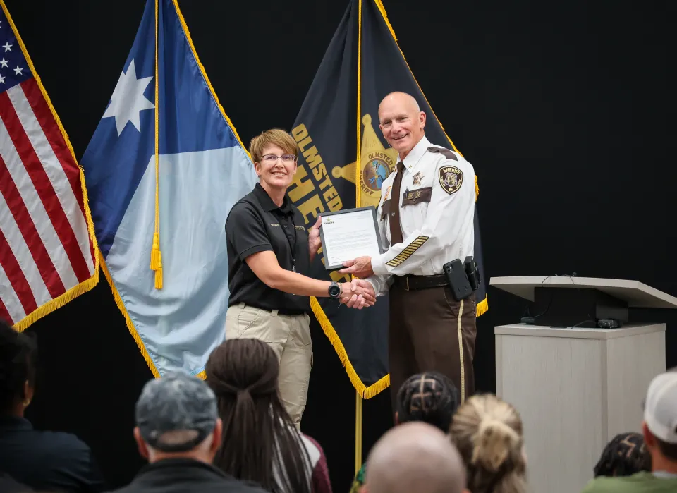 Amy Rayman with Sheriff Torgerson after receiving her Letter of Recognition