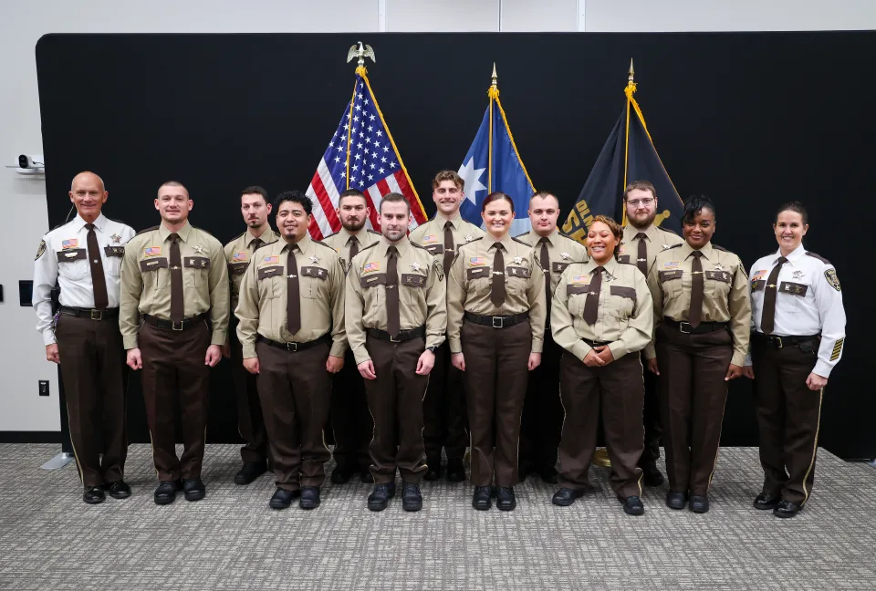 New hires from the Adult Detention Center with Sheriff Torgerson and Director Sam Reps.