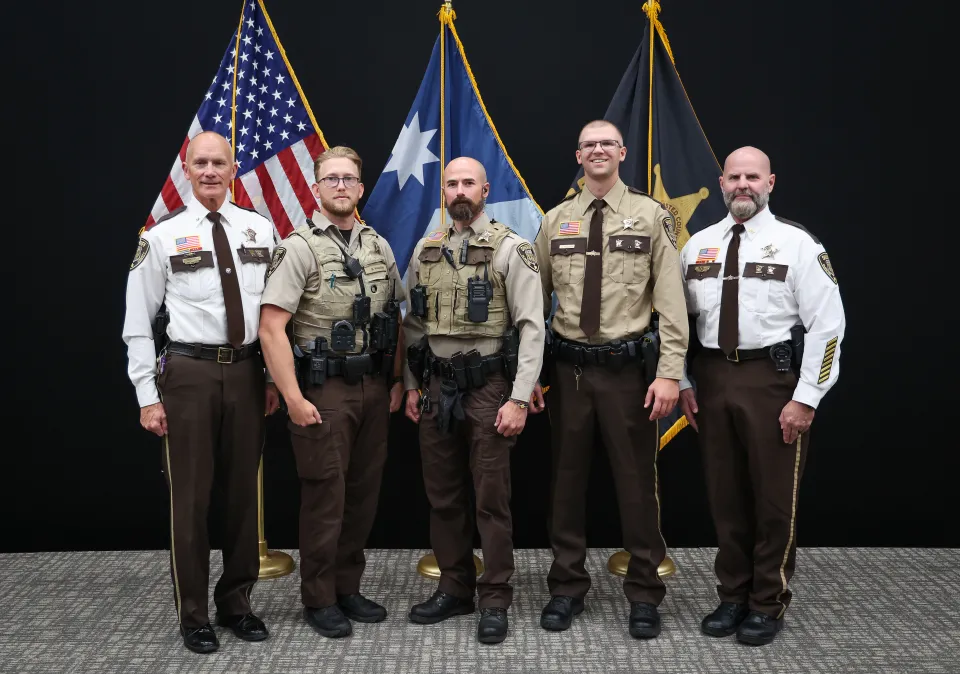 New Law Enforcement deputies standing with Sheriff Torgerson and Chief Deputy James Schueller.