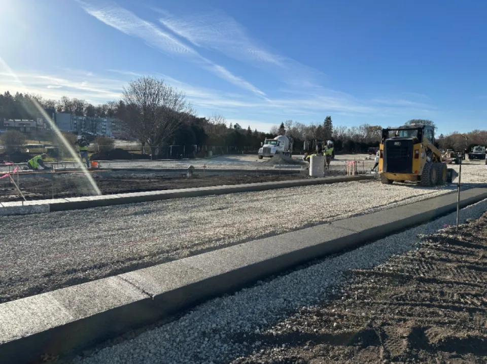 Program support plaza curb installation