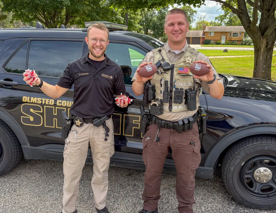 Members of the sheriff's office pose for a photo before a parade in Byron in 2025