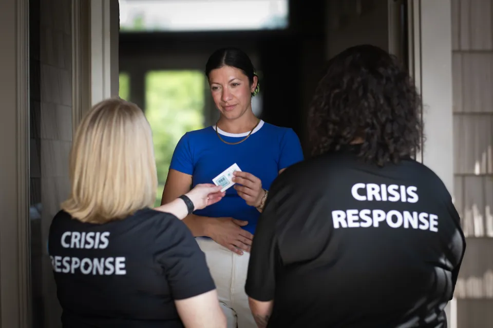 Crisis response team speaking with resident