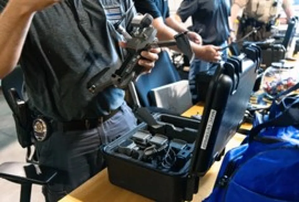 Person holding a drone