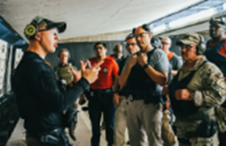 Law enforcement instructor talking to class 
