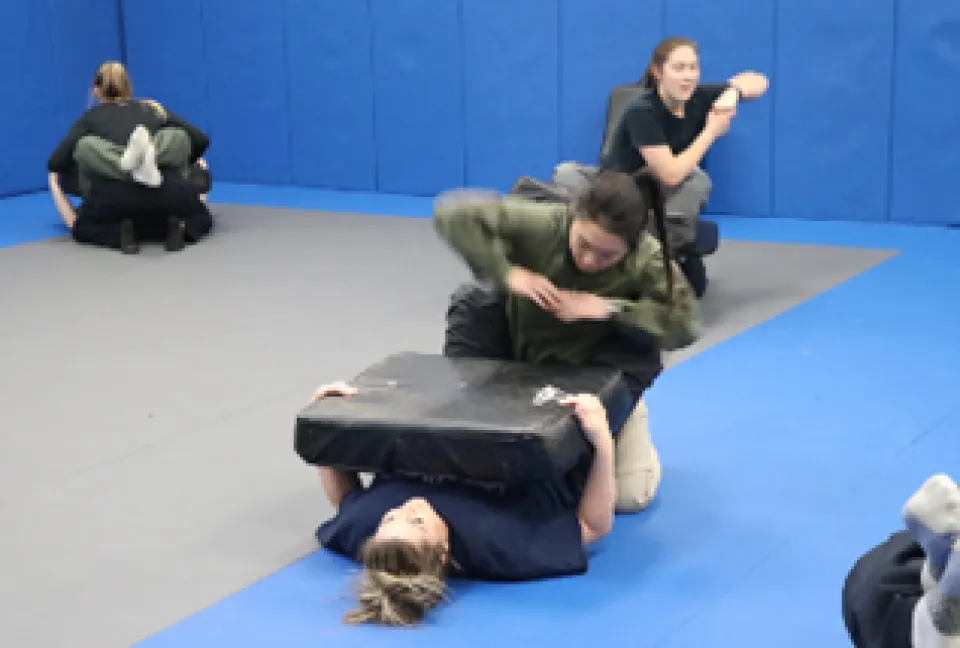 Women using mat room for training