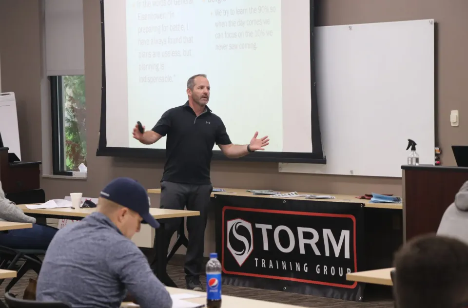 Person in front of classroom teaching