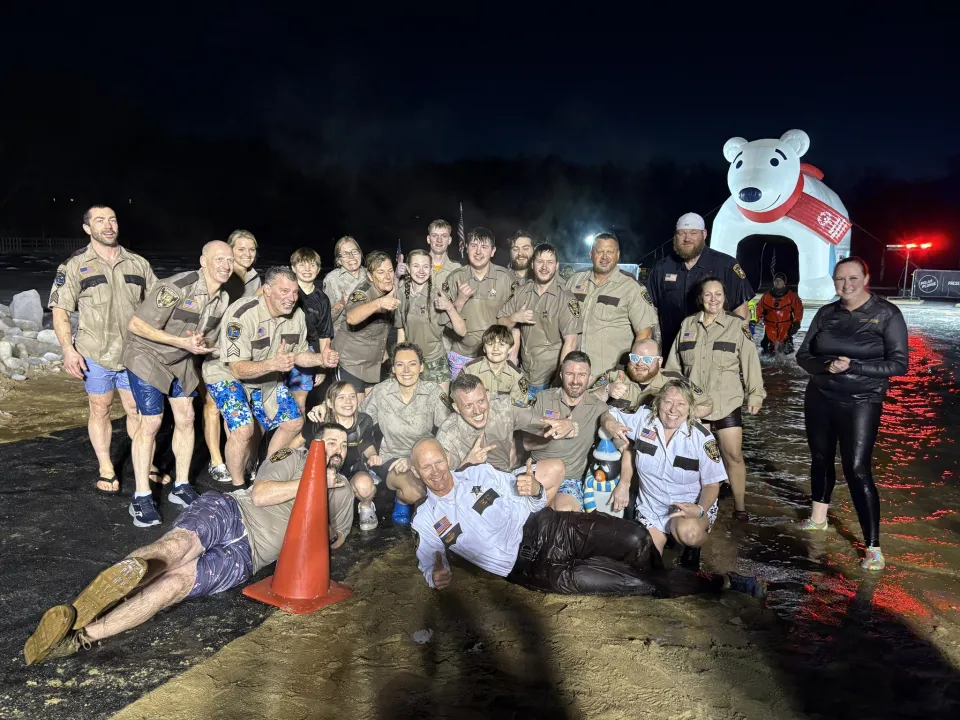 Members of the Sheriff's Office pose for a photo after taking the plunge.