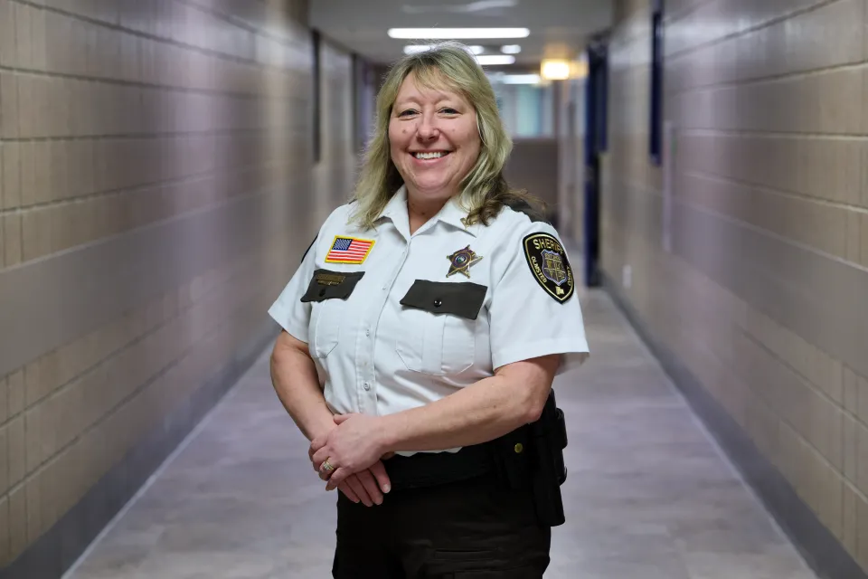 Captain Macey Tesmer stands in the halls of the Olmsted County Adult Detention Center.