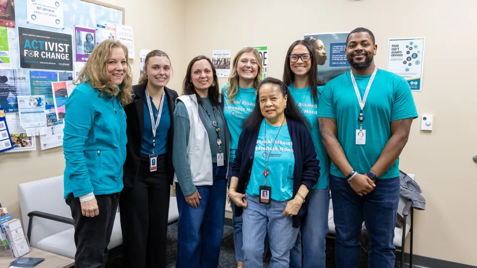 D&O Victim Services staff wearing teal 