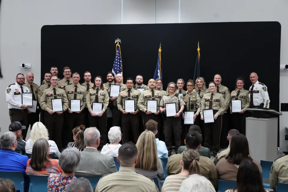 Field training officers for the detention center receive letters of recognition at the spring awards program