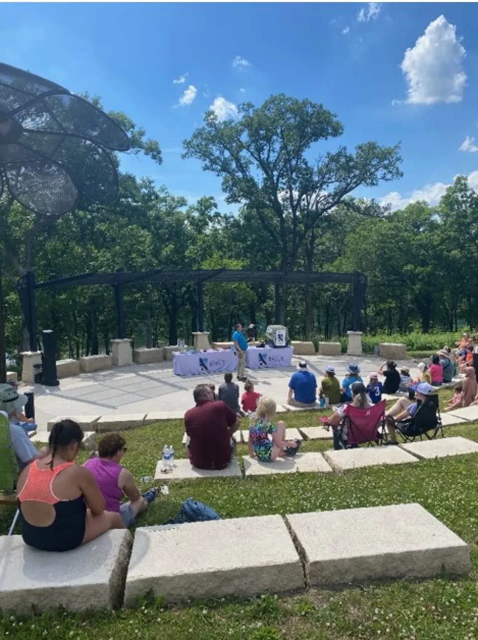 Amphitheater with people sitting around