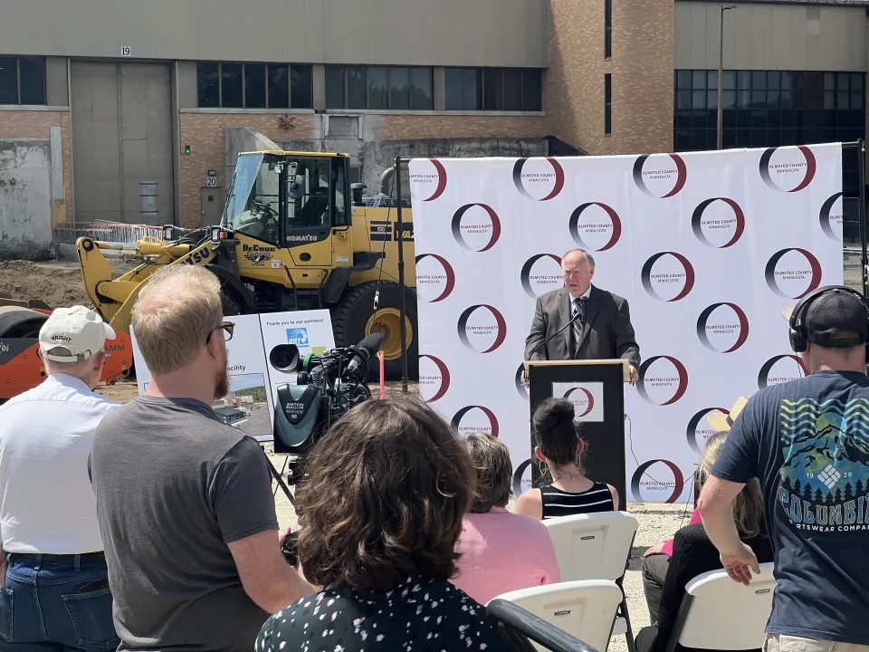 Commissioner Senjem at podium during the MRF groundbreaking