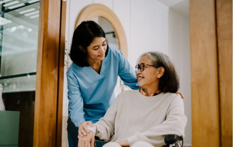 Elderly is getting assistance from a nurse