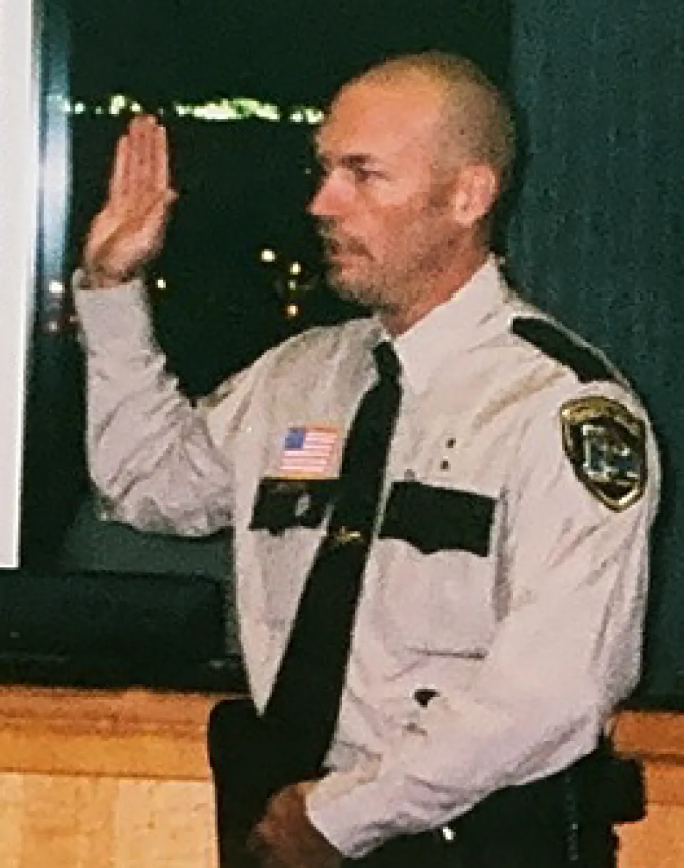 Deputy Tom Olson being sworn into the Olmsted County Sheriff's Office.