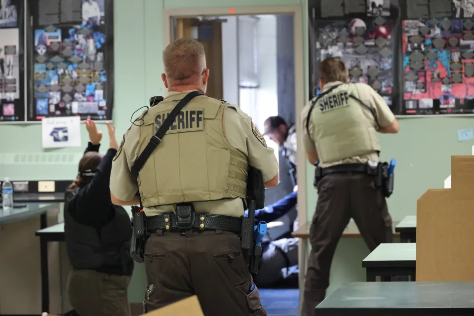 Members of the Olmsted County Sheriff's Office participate in active shooter training.