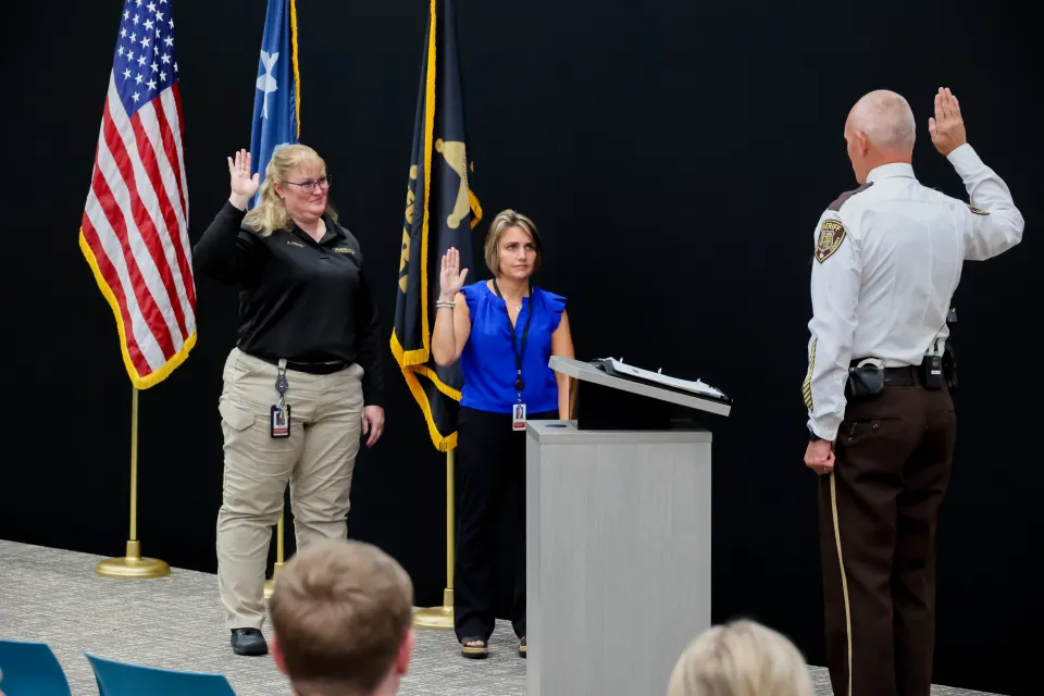 Members of the Olmsted County Sheriff's Office are publicly sworn in by Sheriff Torgerson.
