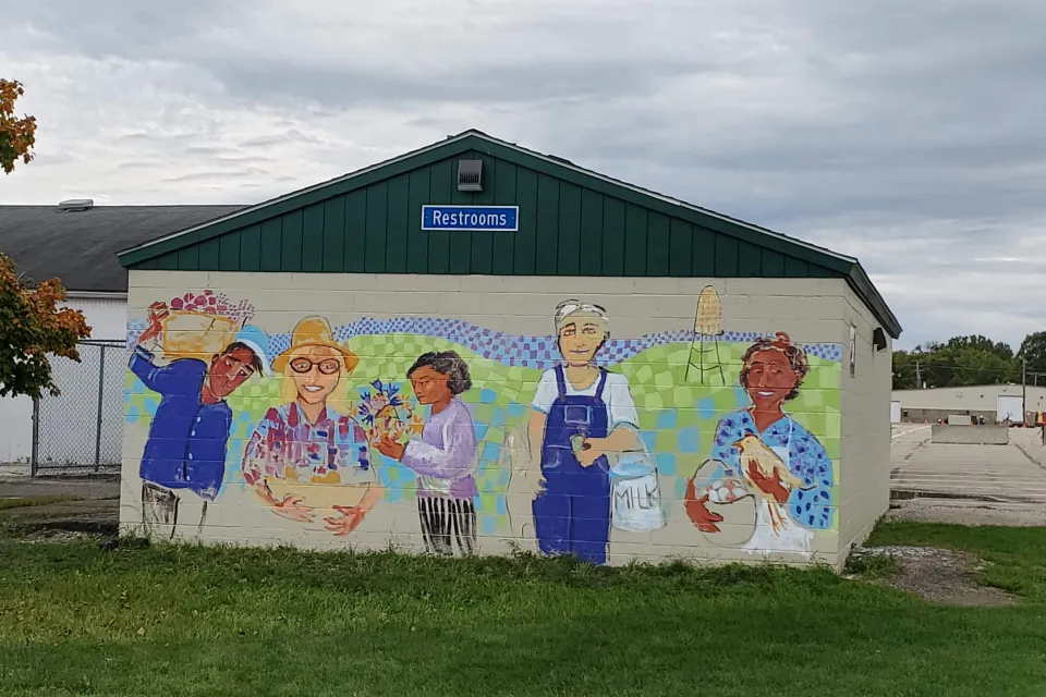 Mural of five people at Graham Park