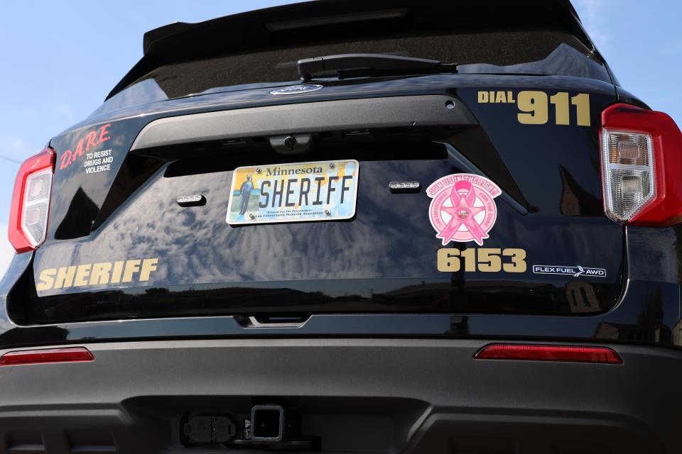 Sheriff's Office Squad with Breast Cancer Awareness Decal on the back