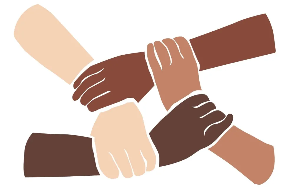 four hands holding on to each other's arms