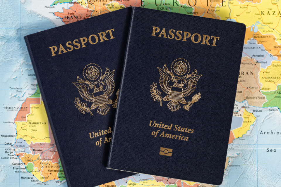 Two passports over a map