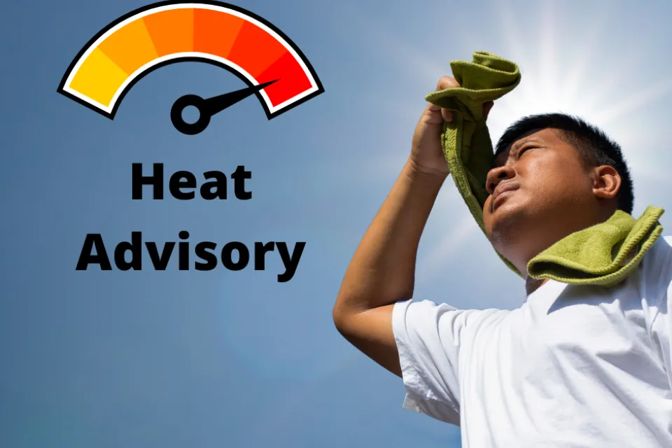 Heat advisory. A person with a towel, shielding the sun.