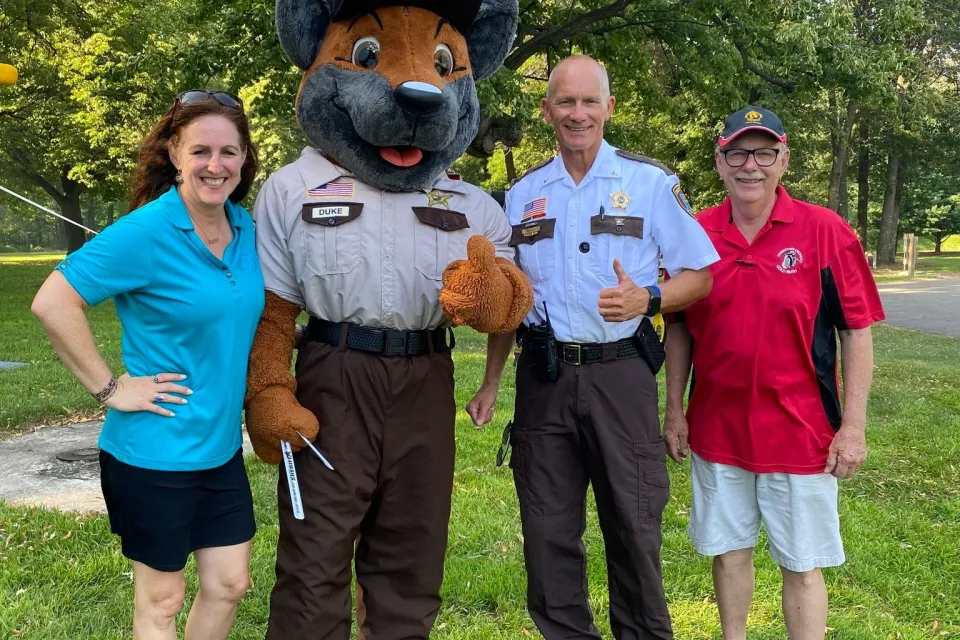 Duke and Sheriff Torgerson at a Night to Unite Event