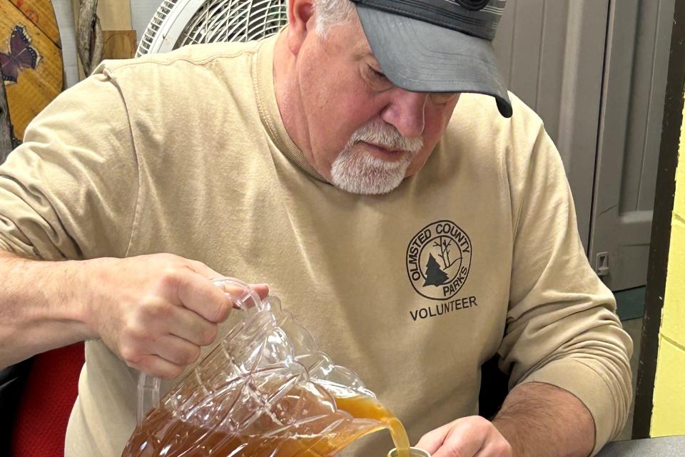 Pouring syrup into containers