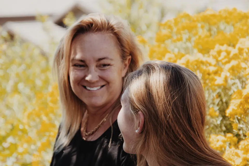 two women looking at each other