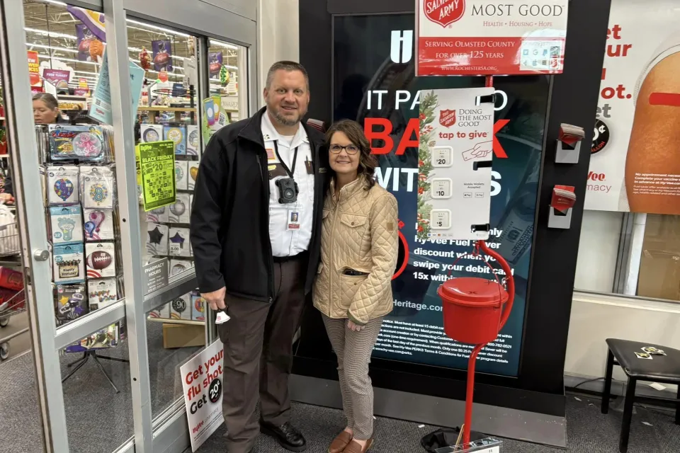 Sheriff's Office employee and spouse ring bells at Hy-Vee for Salvation Army