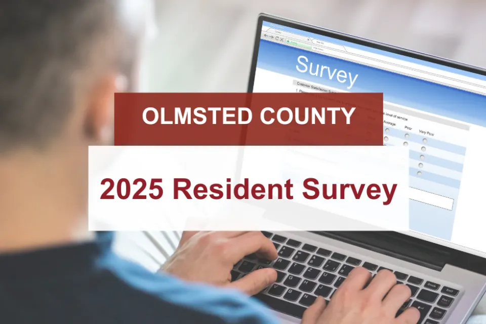 Person typing on computer with overlay that says 2025 Resident Survey