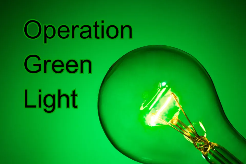 A green light bulb with text that says Operation Green Light